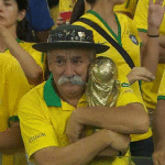 Gaucho da Copa holding onto his replica trophy