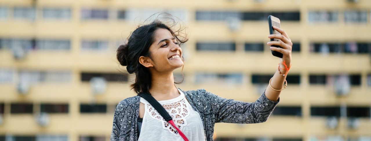 Young influencer taking a selfie