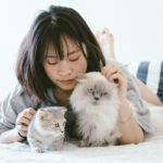 Vietnamese cat owner woman