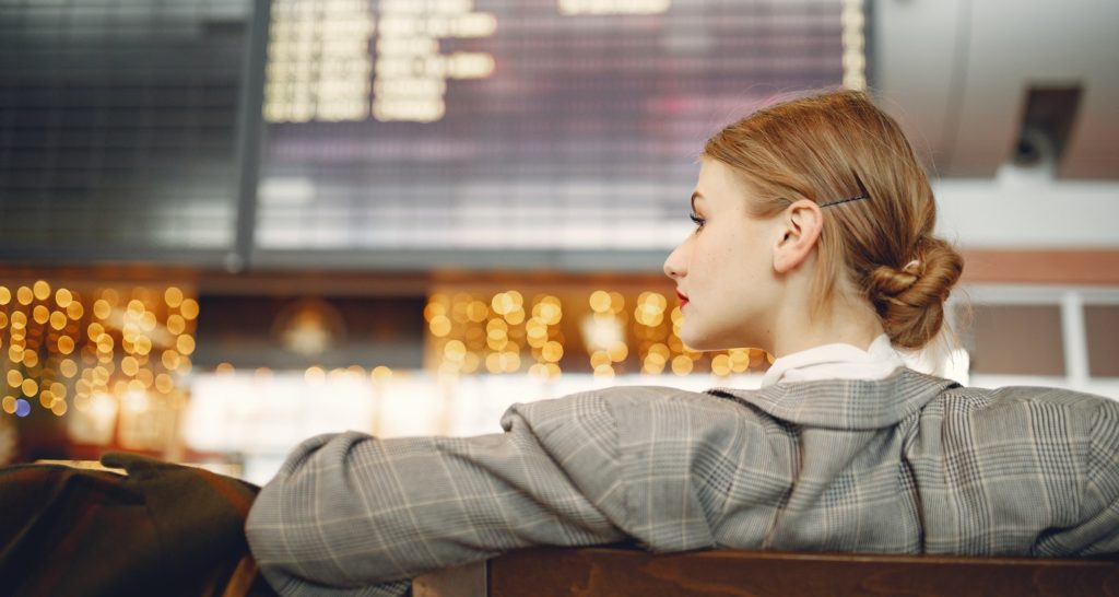 Woman sat at airport