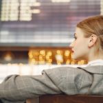 Woman sat at airport