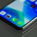 Phone on a table with WhatsApp
