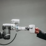 AI robot serving coffee to banker