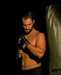 MMA Fighter PPV with UFC gloves
