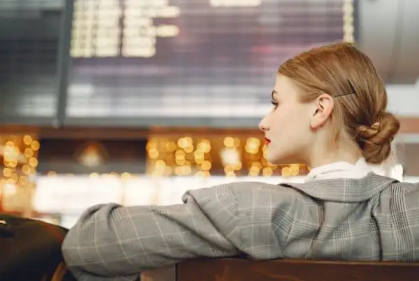 Woman sat at airport