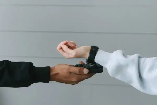 Person Paying Using Her Smartwatch for data transfer