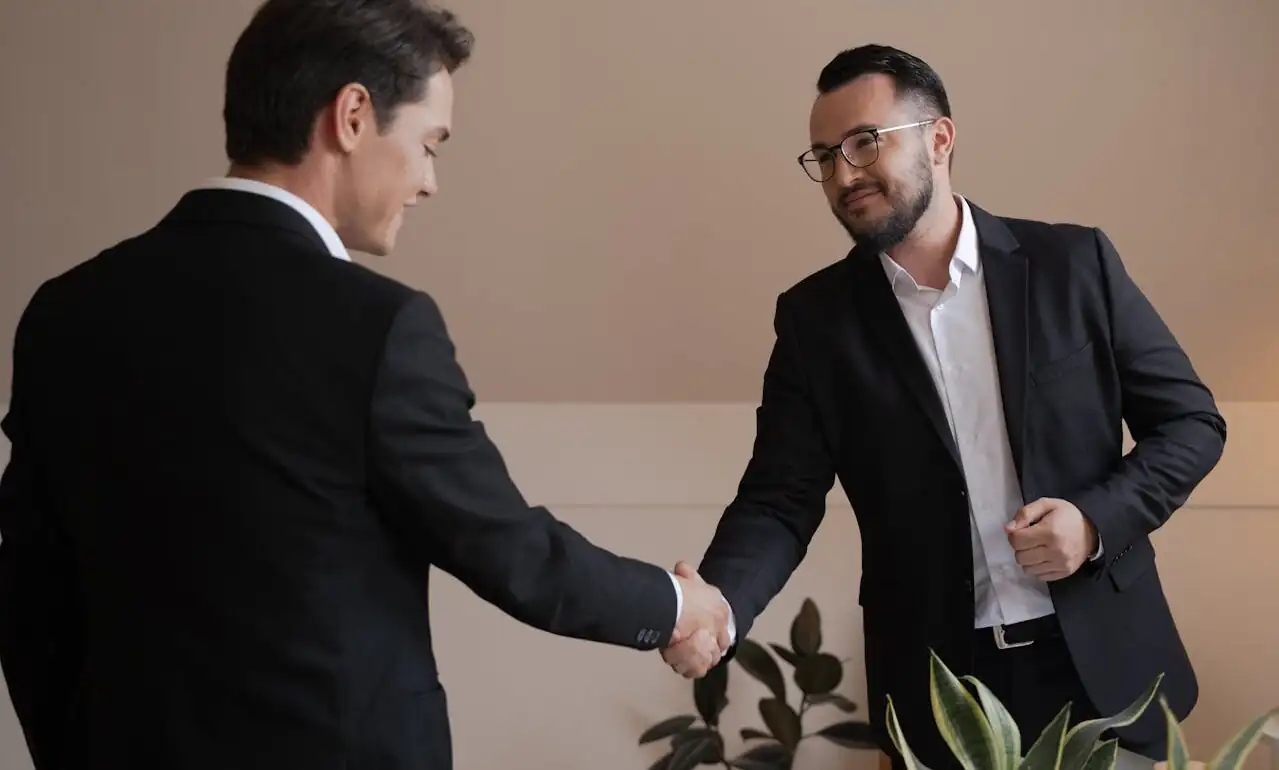 Fintech leaders handshake